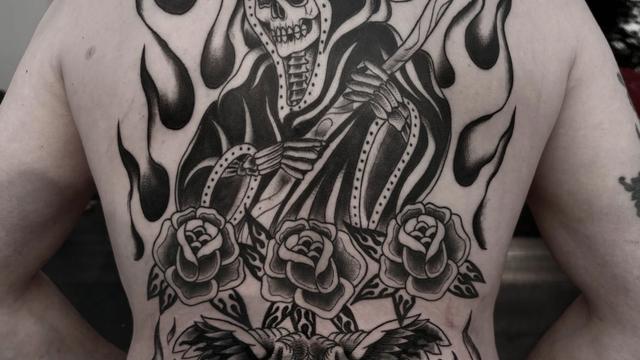 Custom large-scale blackwork back tattoo by M.INK Tattooing, Winnipeg — example of consultation-based design work.