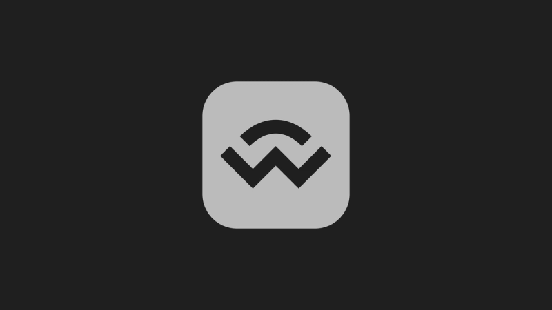 WalletConnect logo set in a greyscaled button with a black background