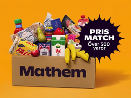 På bilden syns en Mathemlåda fylld med varor, och texten "Prismatch, över 500 varor"