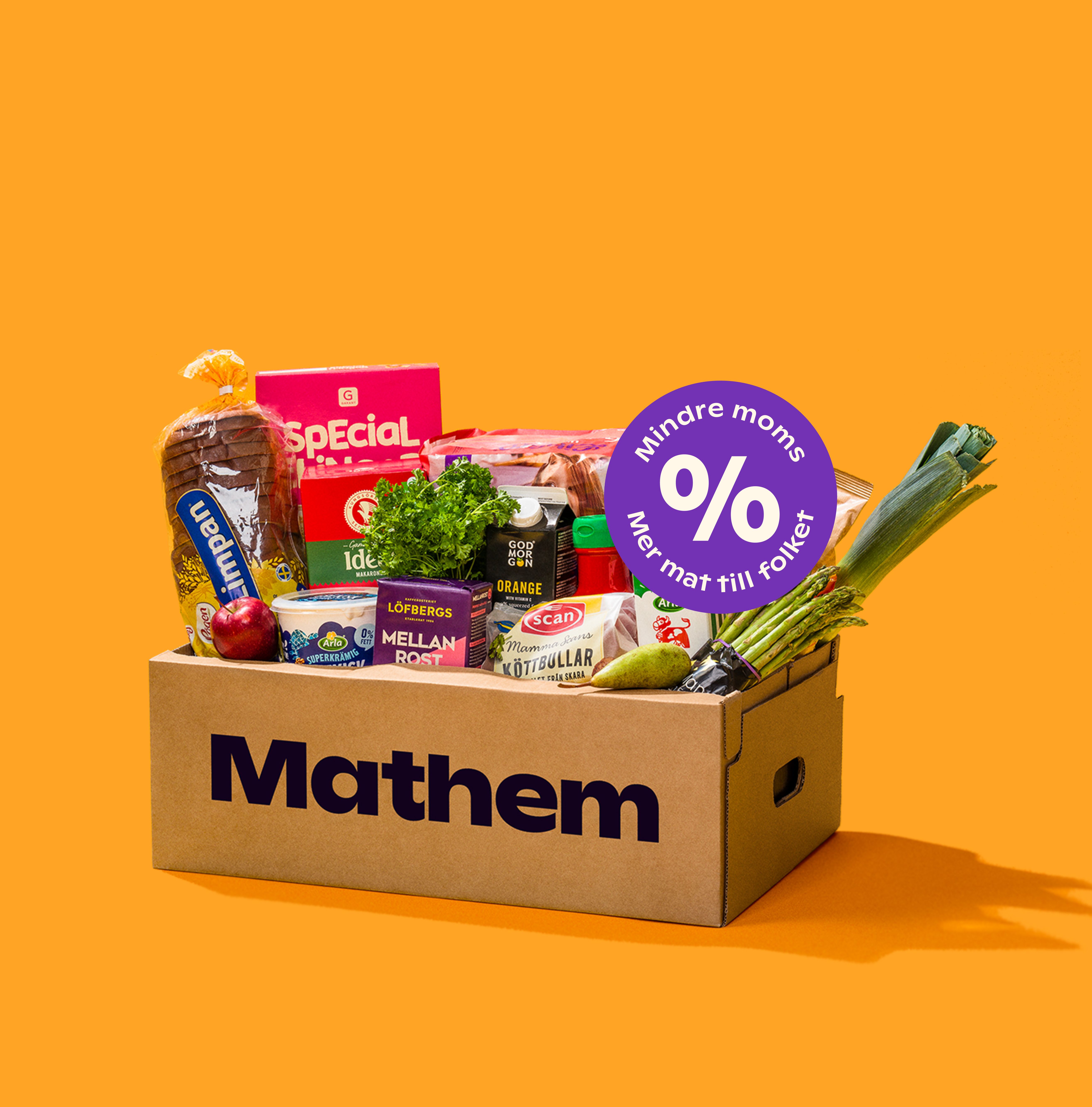 På bilden syns en Mathemlåda fylld med varor mot en orange bakgrund och texten "Vi halverar matmomsen redan nu"