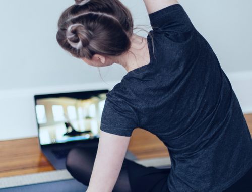 A woman doing virtual yoga