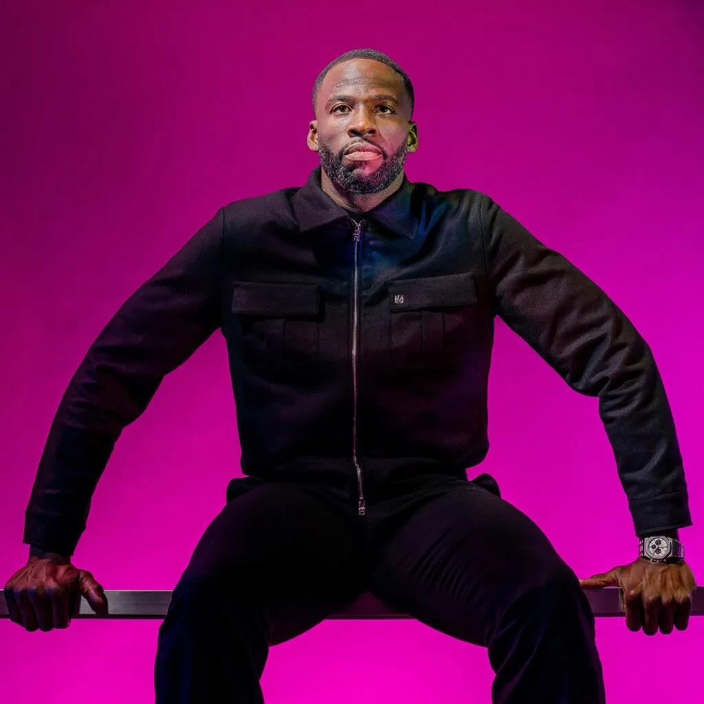 Draymond Green speaking on stage