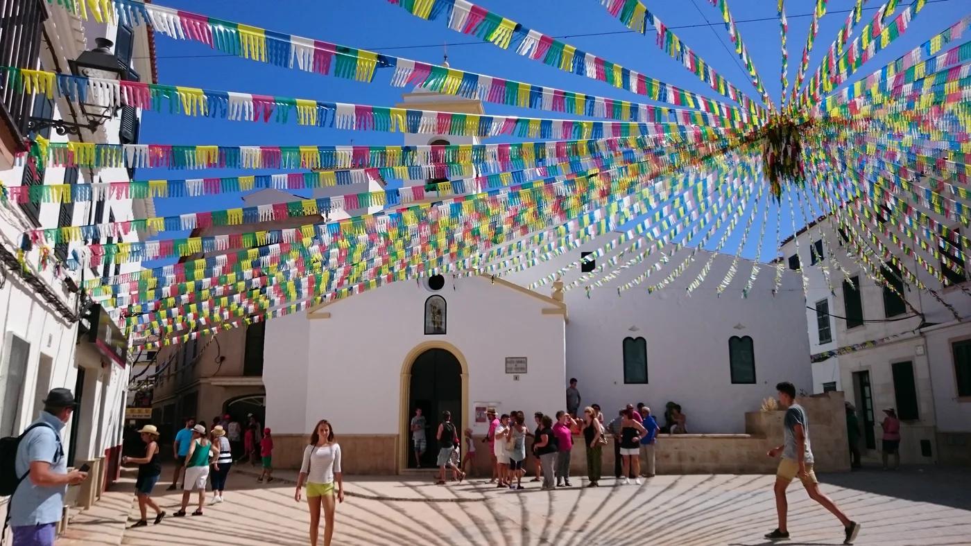 The village square and church of Es Migjorn Gran decorated for the Sant Cristòfol festivities