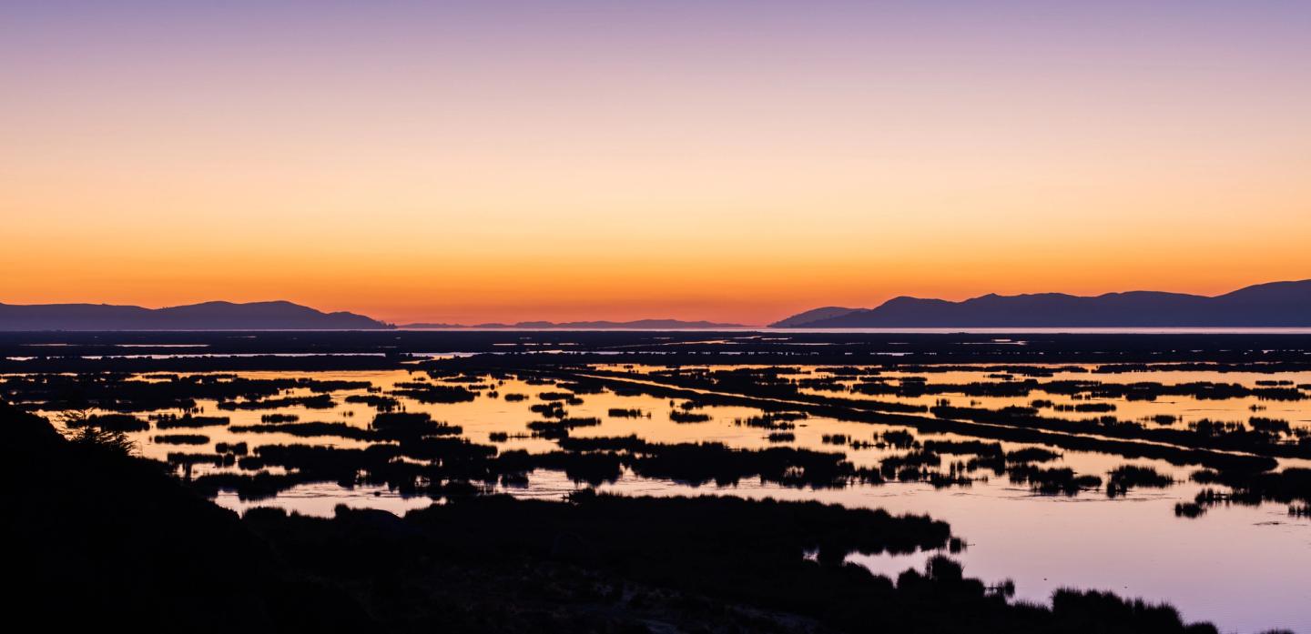 Sunrise over Lake Titicaca near Puno.