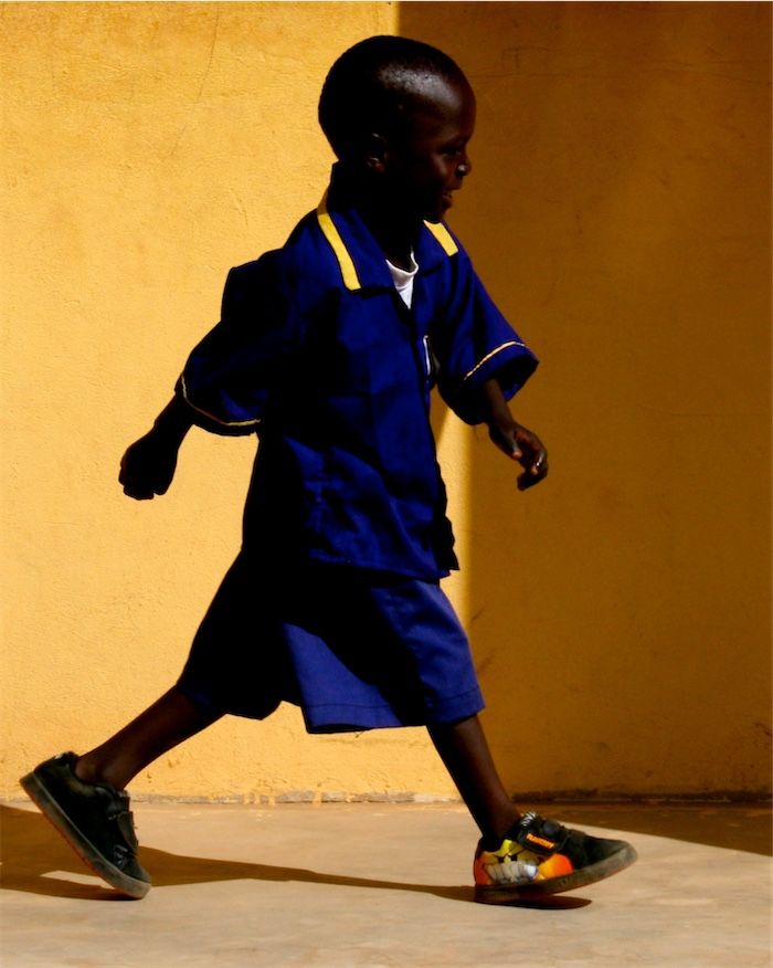 Gambian kid walking