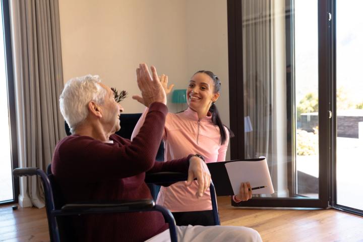 Clincian and aged care client completing an assessment