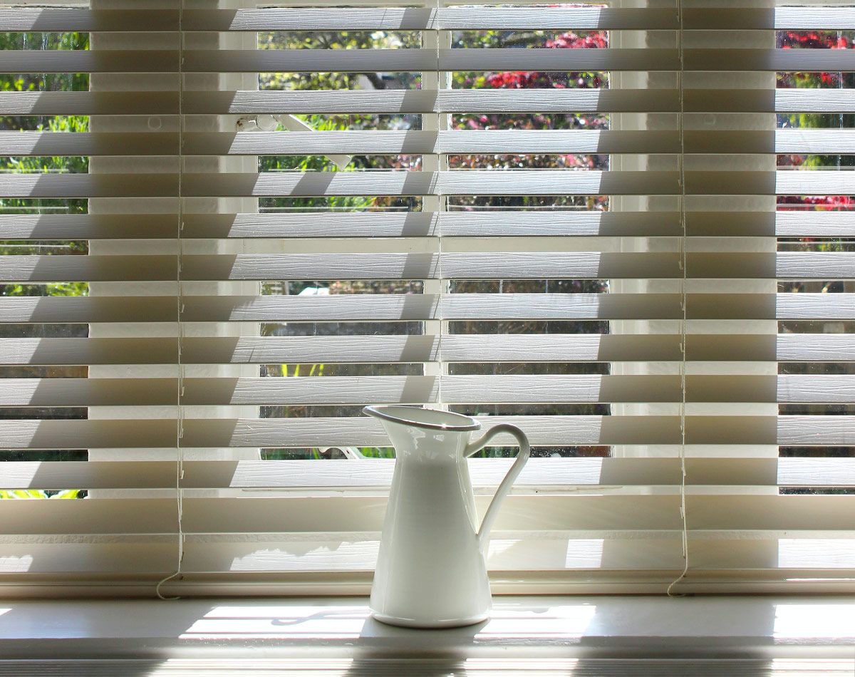 White window shades inside home