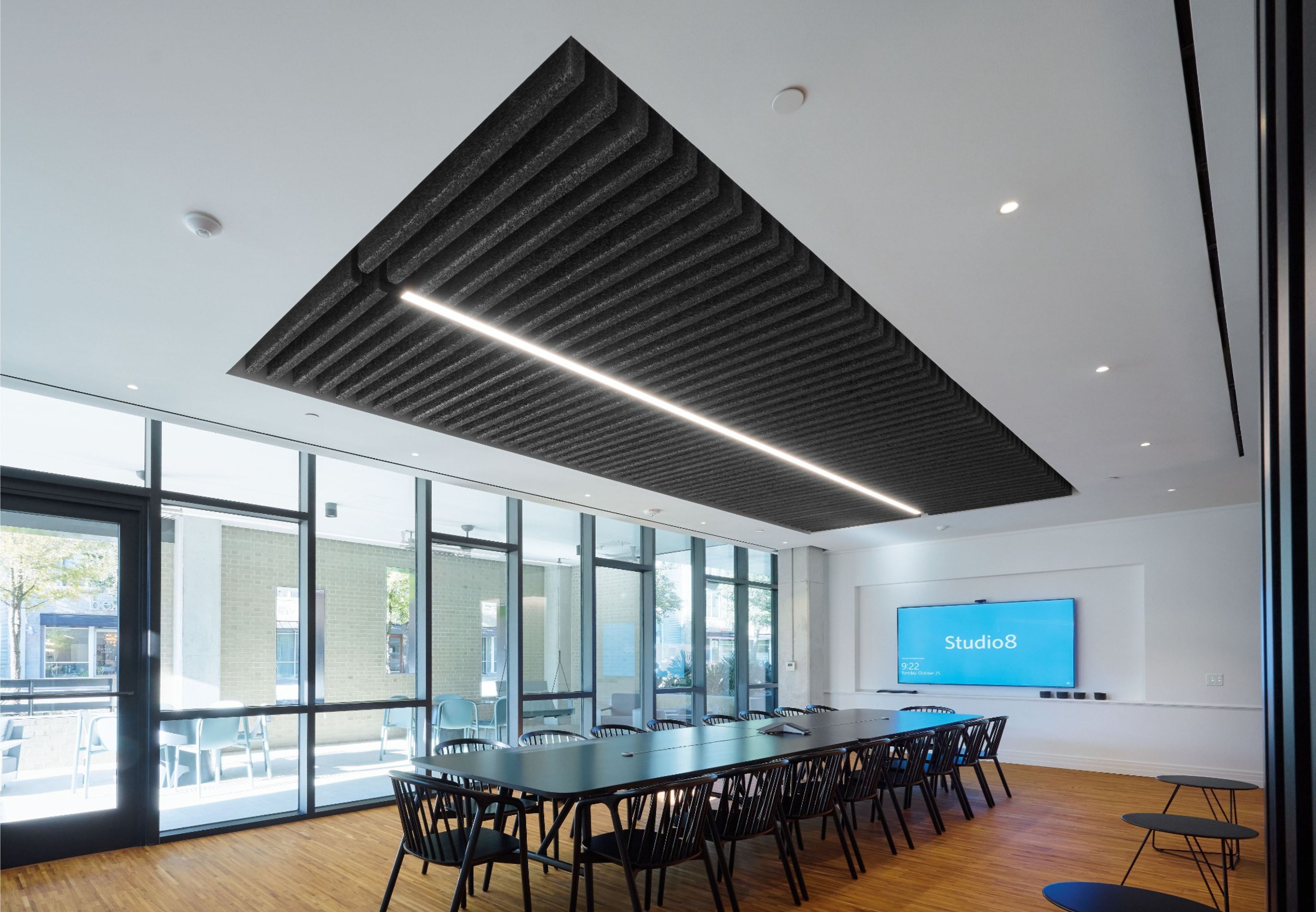 Black Tectum baffles installed over the conference table at Studio8
