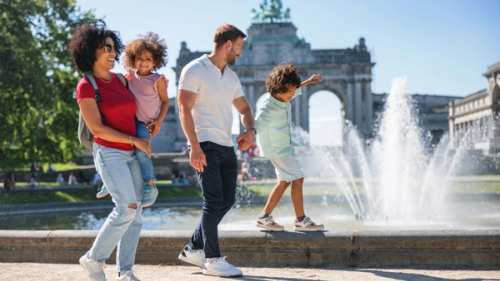 Family walking in Brussels in the summer