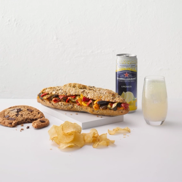 Sparkling water, a sandwich and a cookie - example of a snack available to all customers in Eurostar Café