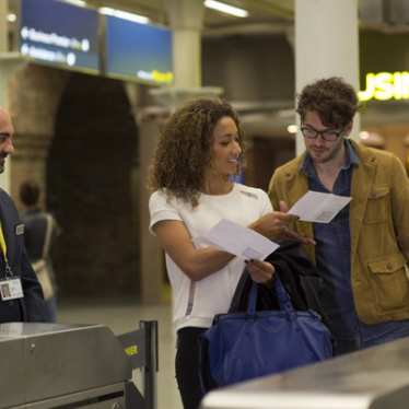 Couple at St Pancras London Checking in