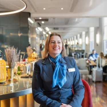 Portrait of Customer Service team member in the Lounge at London St Pancras International.