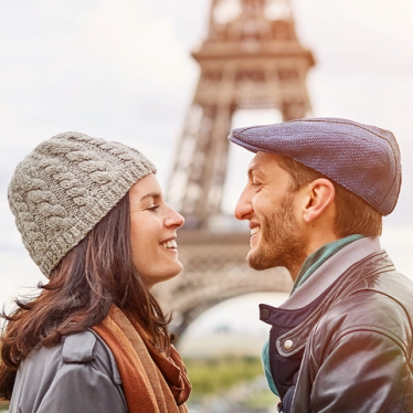 Couple in front of the Eiffel Tower