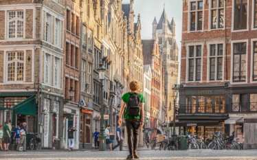 Man walking around Bruges