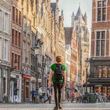 Man walking around Bruges