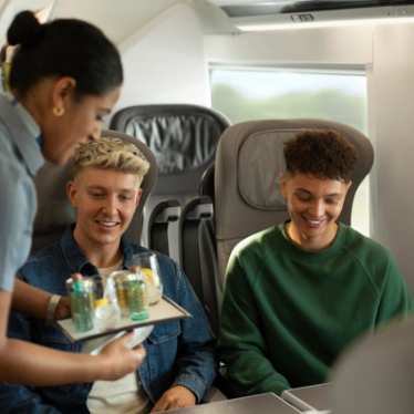 Eurostar sfaff serving drinks on board