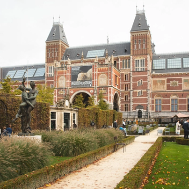 People in the gardens outside the Rijksmuseum in Amsterdam.