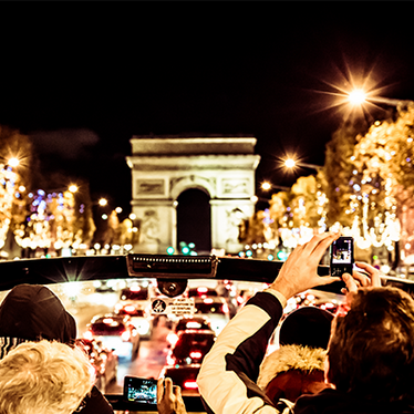 Open air Tootbus in Paris, Arc de Triomphe, at Christmas