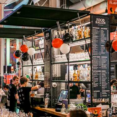 Buzzy bars and food stalls at De Hallen in Amsterdam
