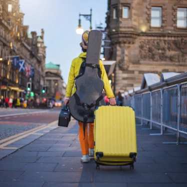 Street performer leaving after performing 