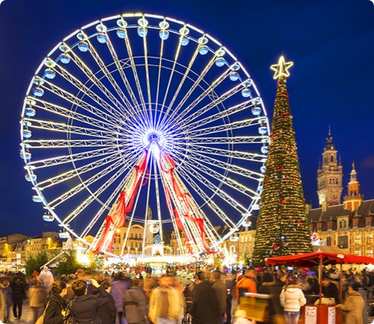 Christmas market and Ferris wheel in Lille, France
