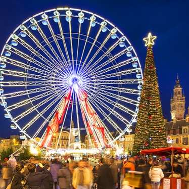 Christmas market and Ferris wheel in Lille, France
