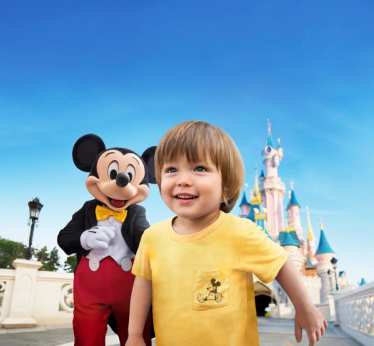 Disneyland Paris - child and Mickey Mouse