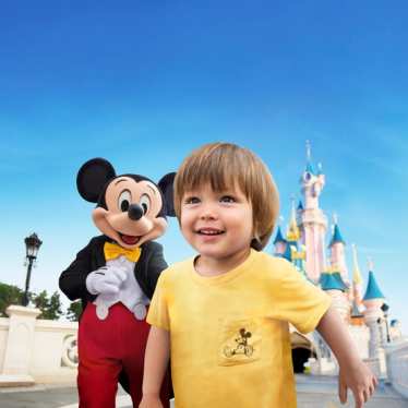 Disneyland Paris - child and Mickey Mouse