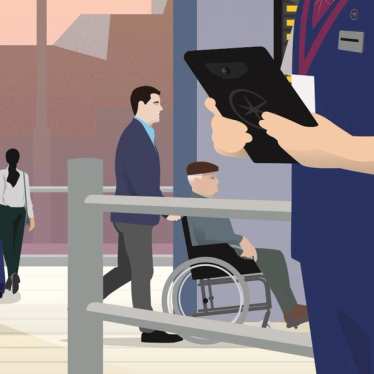 Illustration of wheelchair user and companion at Eurostar departures