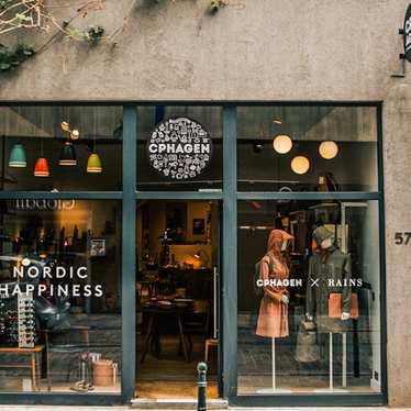 A view of the storefront and through the open door of Nordic concept store CPHAGEN in Brussels.