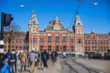 View of Amsterdam street - Amsterdam Centraal / Central station - people