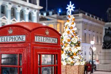 Red telephone box and Christmas tree in London