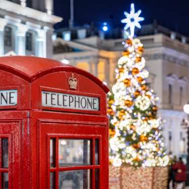 Red telephone box and Christmas tree in London