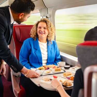 On board - Team member serving a meal - Food