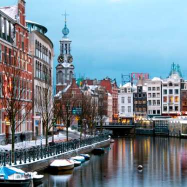 Canals of Amsterdam under snow at Christmas