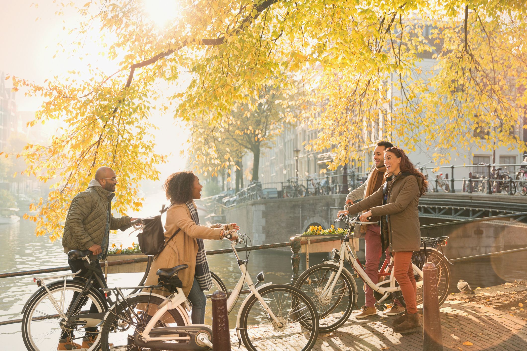 Friends on bike in Autumn in Amsterdam 