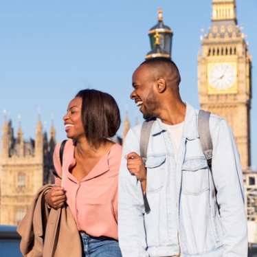 Smiling people with Big Ben in the background