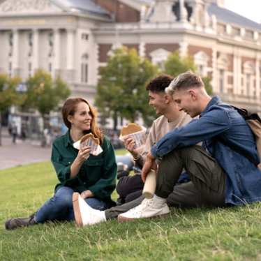 Amsterdam - youth fares - people eating snacks 