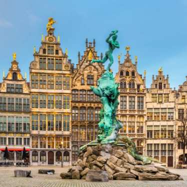 A view of Brabo's Monument against the buildings of the centre of Antwerp.