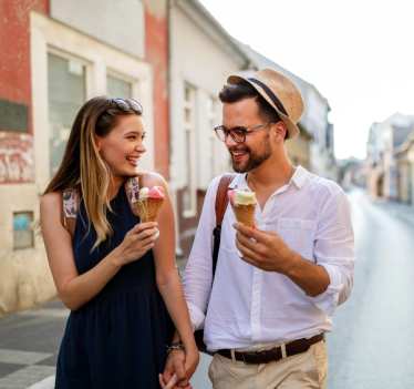 Couple eating ice cream on holiday