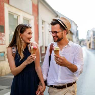 Couple eating ice cream on holiday