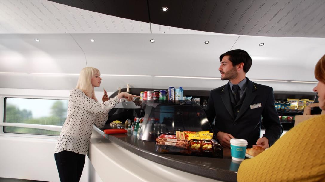 Woman getting served snacks onboard of Eurostar