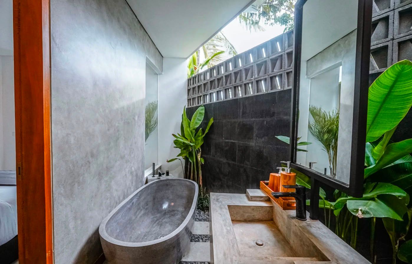 Second bathroom with polished-concrete finishes