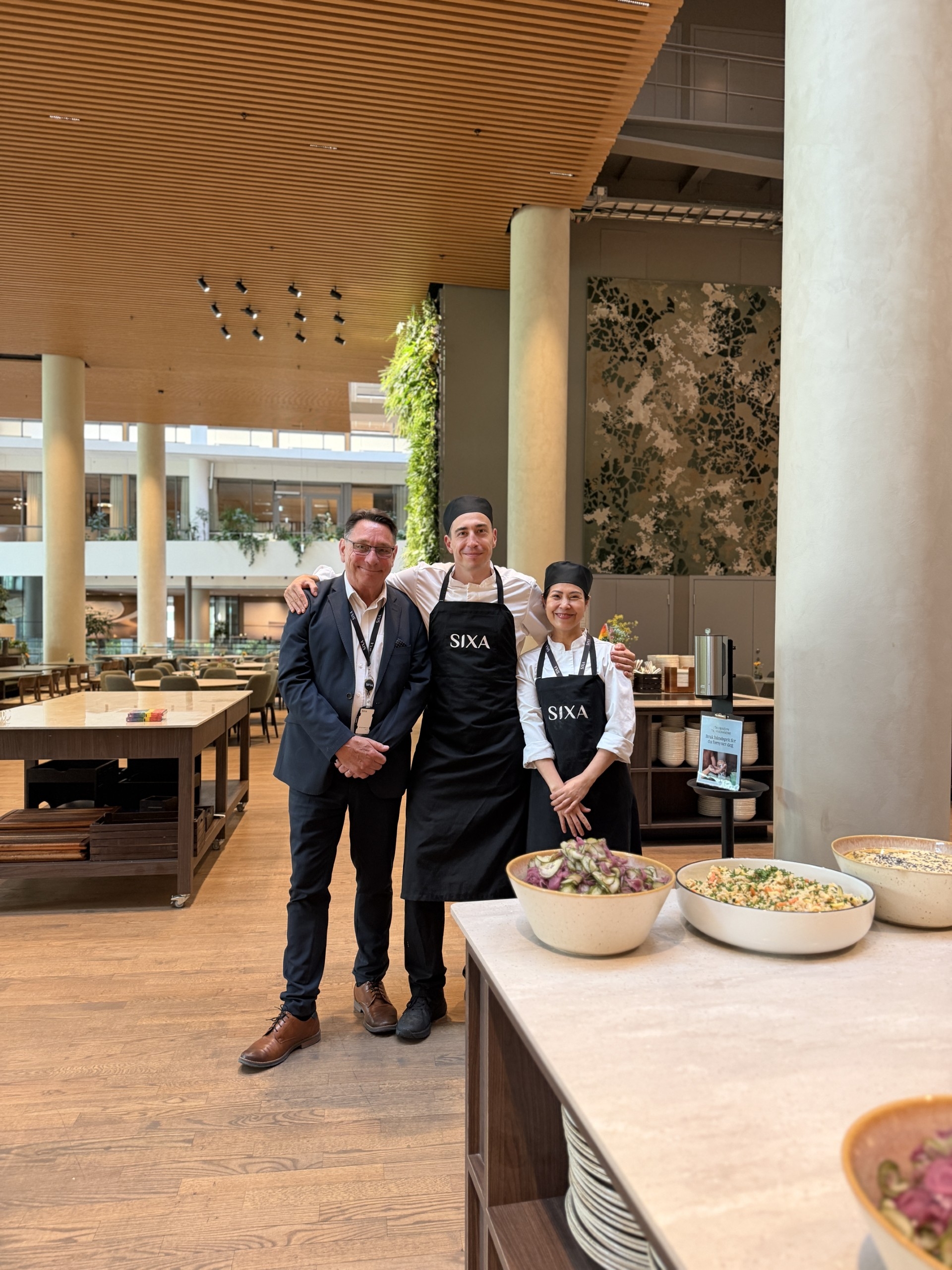 Knut Lie, Sophie, and Adrian at SIXA, who all see the value of Norwegian language classes in their daily work.