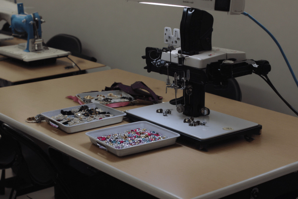 Applied Embellishment And Rhinestone Setting.