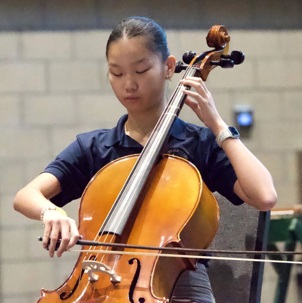 A student performs on the cello