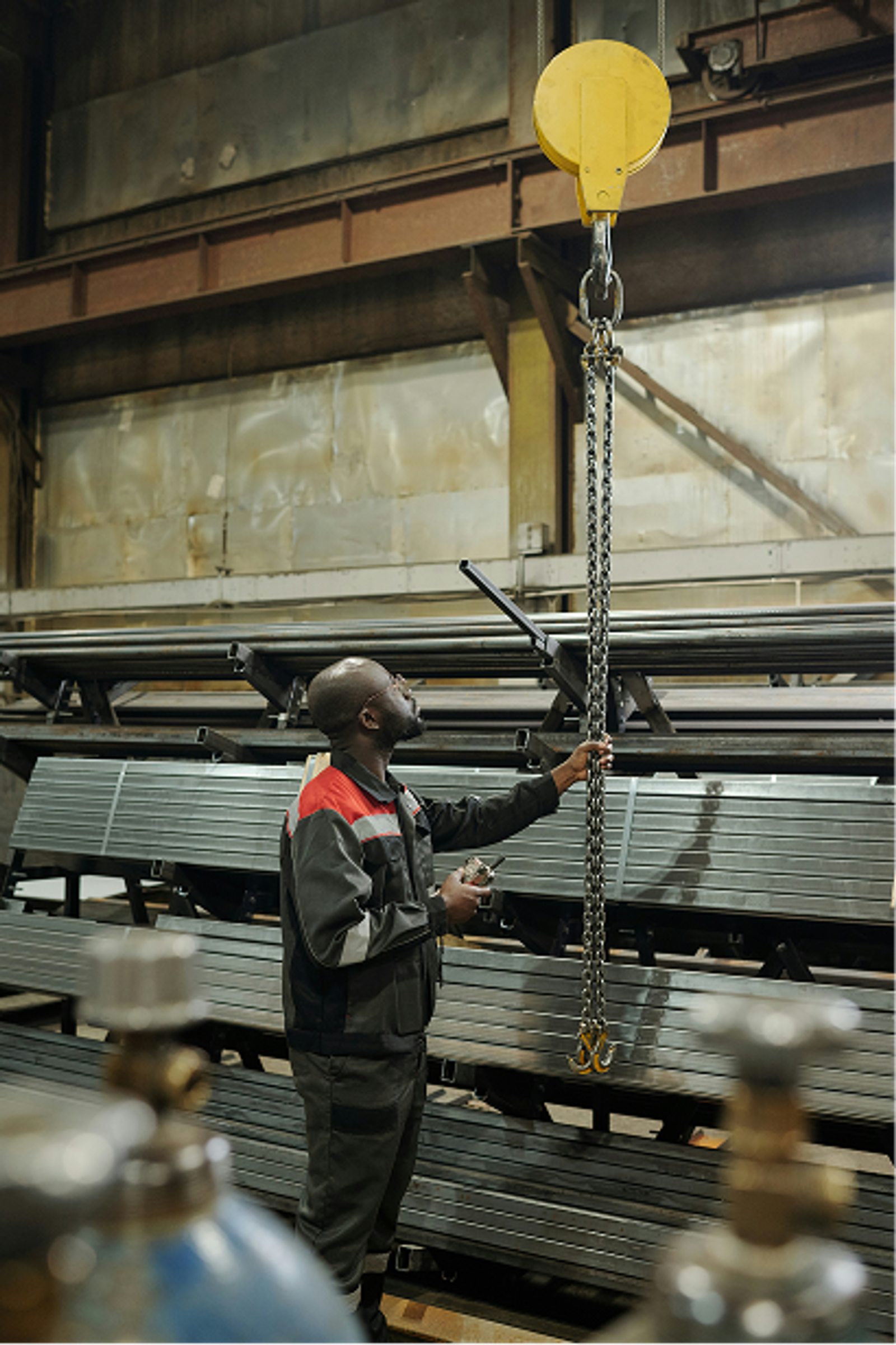 A man overseeing industrial equipment