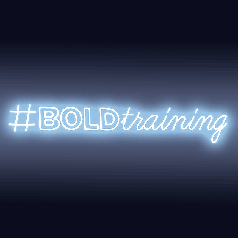 Neon sign on dark background that says #BOLDtraining.