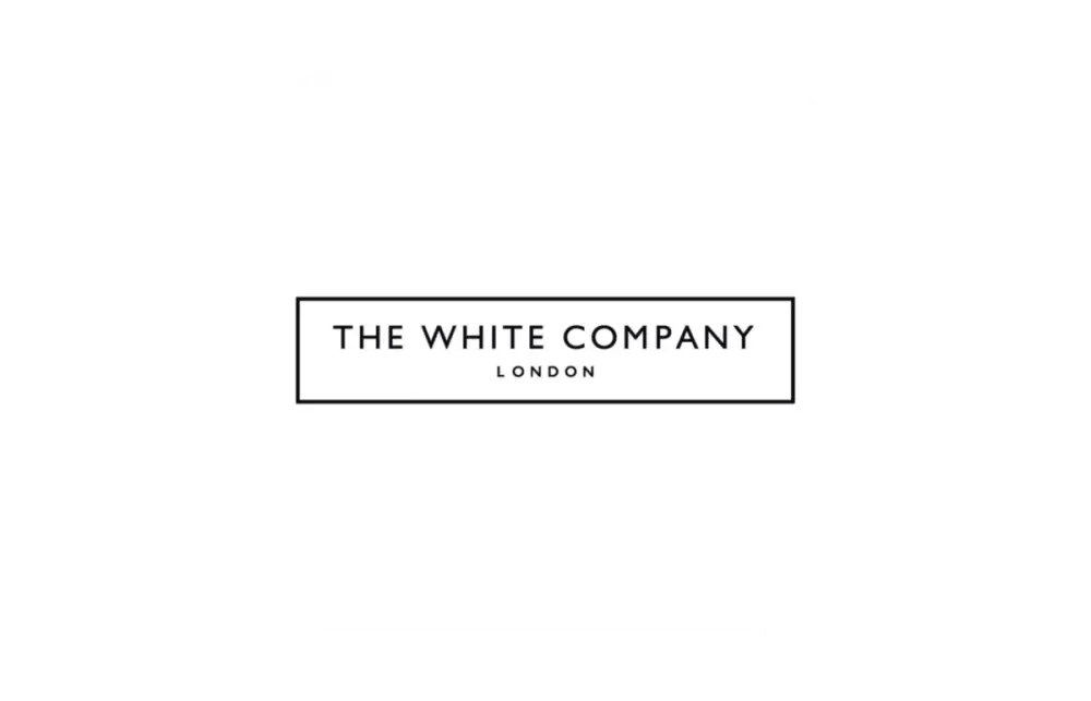 The White Company logo – discover luxury home and lifestyle offers.