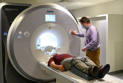 Volunteer going into MRI scanner